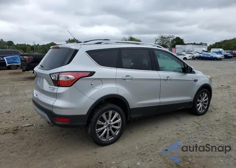 2017 Ford Escape Titanium z USA, uszkodzony, nr VIN 1FMCU9JD7HUE50719